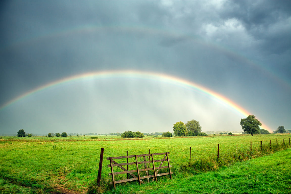 Rainbow after thunderstorm in summer